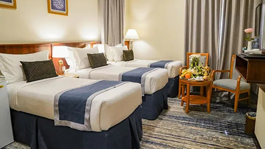 3 single beds room
